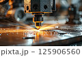 Laser cutting process in an industrial workshop with focused precision and advanced technology 125906560