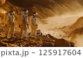 Astronauts are currently exploring a breathtaking Martian landscape while wearing advanced futuristic space suits Astronauts are currently exploring a breathtaking Martian landscape while wearing advanced futuristic space suits 125917604