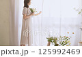 A woman adorning flowers 125992469
