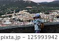Young tourist observing Alcoy city from a viewpoint 125993942