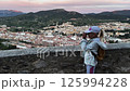 Young tourist observing Alcoy city from a viewpoint 125994228