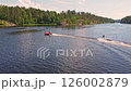 Water skiing adventure on a serene lake in summer 126002879