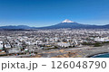Aerial view - Fuji City, Shizuoka Prefecture, urban area, Japanese cityscape, Mt. Fuji, tourism, business, dolly out 126048790
