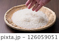 Raw Japanese rice in a colander 126059051