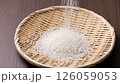 Raw Japanese rice in a colander 126059053