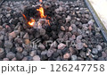 溶岩石の上に揺れる炎のゆらめき 126247758