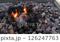 溶岩石の上に揺れる炎のゆらめき 126247763