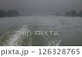 Moving on the foggy river Danube in Austria in autumn 126328765