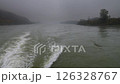 Moving on the foggy river Danube in Austria in autumn 126328767