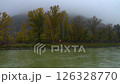 Moving on the foggy river Danube in Austria in autumn 126328770