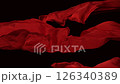 Red color fabrics flying in midair, Slow Motion 126340389