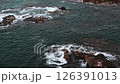sea with waves and rocks. Dramatic view on the top of the ocean surface from above of drone 126391013