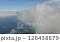flying over a scenic coastal town and ocean 126438879