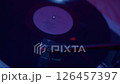 Artistic Vinyl Record Player Amidst Ambient Lights 126457397