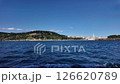coastal city view from a moving boat at sea 126620789