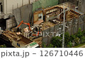 Time lapse, house demolition work, scaffolding removal, construction company, heavy machinery, danger, safety first 126710446
