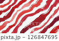 A close up of a red and white striped pattern of bacon 126847695