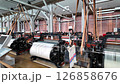 NAGOYA, JAPAN - Apr 18, 2025: Weaving machines inside the Toyota Commemorative Museum of Industry and Technology.  126858676