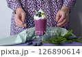 Decoration Blueberry smoothie in shades of purple 126890614
