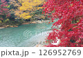 4K video. Beautiful autumn scenery in Japan. Red and yellow leaves, flowing river. 126952769