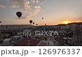 Morning in Cappadocia - Hot air balloons seen from the rooftop 126976337