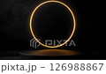 A glowing golden ring floating above a dark, minimalistic platform with soft ambient lighting, creating a futuristic and elegant atmosphere 126988867