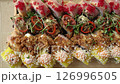 Sushi set with caviar, fried onion, rice, and salmon. Delicious oriental food. Traditional Japanese dish. Top view. Food delivery. 126996505
