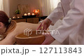 Experience a deeply relaxing Spa Massage Therapy Session enhanced with soothing Essential Oils 127113843