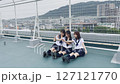 High school girl taking photos on the rooftop 127121770