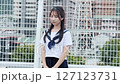 high school girl standing on the roof 127123731