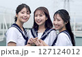 High school girls holding hands 127124012