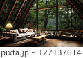 Rustic wooden cabin, with large windows that allow you to see the forest landscape in a rainy day 127137614
