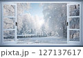 Winter landscape with falling snow, seen through an open window 127137617
