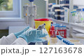 Medical laboratory research lab scientist take samples with pipette 127163678