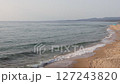 Peaceful Sandy Beach with Gentle Ocean Waves Peaceful Sandy Beach with Gentle Ocean Waves 127243820