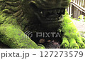Moss-Covered Lion Statue, Ancient Guardian in a Sacred Monkey Forest, Ubud, Bali, Indonesia. 127273579