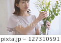 A woman adorning flowers 127310591