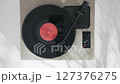 Elegant Vinyl Record Turntable with Controls 127376275