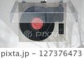 Elegant Vinyl Record Turntable with Controls 127376473