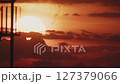 Big sun at sunset in real time 127379066