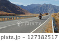 Motorcyclists Riding on a Scenic Mountain Road 127382517