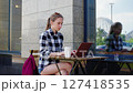 Freelancer, copywriter young woman typing on laptop 127418535