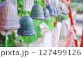 Southern wind chimes swaying in the afternoon summer breeze Focus out Fix 127499126