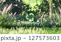 3D animation render of a green recycle symbol standing in a lush forest 127573603