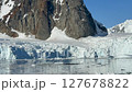 Big Iceberg in Antarctica Winter Scenery, Amazing Shape Ice Formation of Massive Large Enormous Blue Icebergs in Antarctic Peninsula Landscape Seascape with Ocean Sea Water 127678822