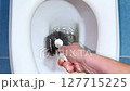 Flushing of water in the white bowl at home hygiene order clean 127715225