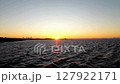 Sunset seen from the sea 127922171