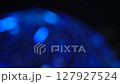 Blue bokeh background video. Illuminations shining at a fast pace. 127927524