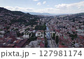 Aerial dolly forward scenic european city Sarajevo old town and river miljacka	 127981174