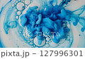 Blue abstract background with liquid ink and bubbles mixing 127996301